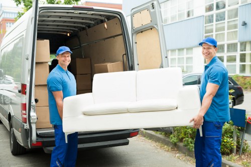 Removal van and moving boxes in a Westcombe Park residential street