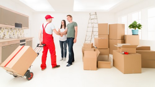 Packed moving boxes and furniture for a Westcombe Park removal van service