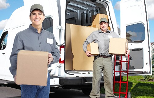 Commercial movers relocating office equipment in Westcombe Park
