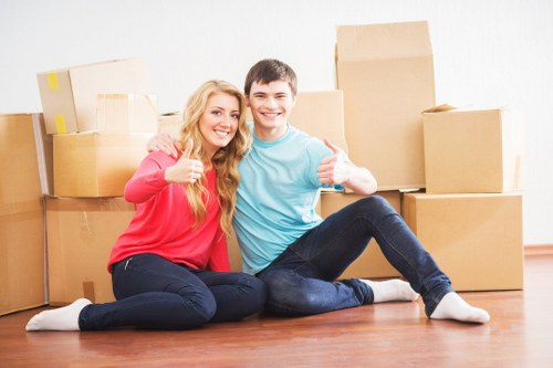 Careful loading of household items during a Westcombe Park move