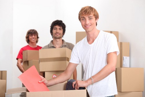 Packed office items and furniture prepared for a local commercial move